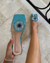 Clem Clear Aqua Blue Metallic Evil Eye Flat Sandals