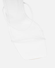 Neeli White Triple Strap Heeled Sandals